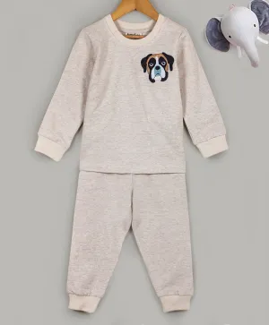 Beige tracksuit with dog face embroidery on chest