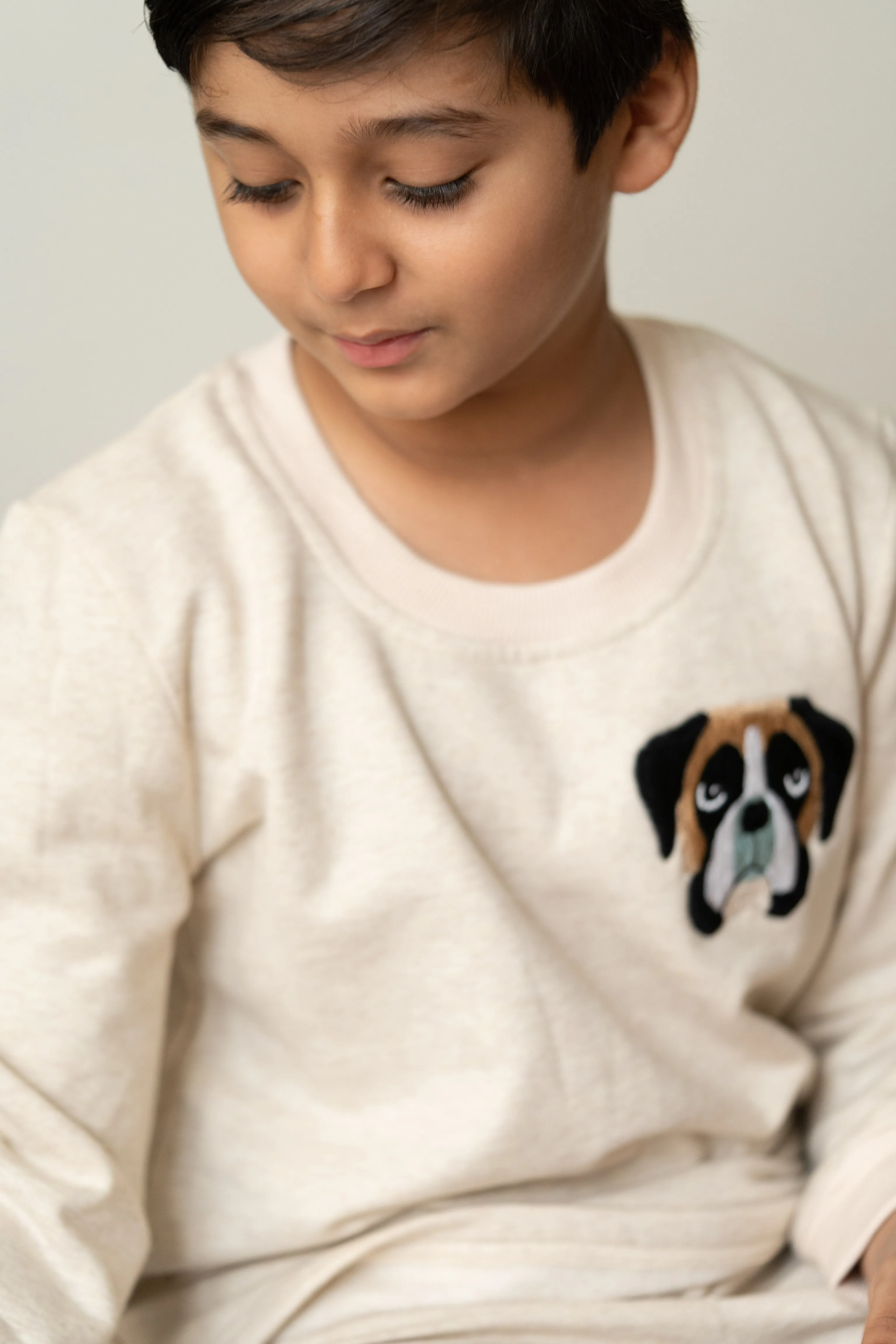 Beige tracksuit with dog face embroidery on chest